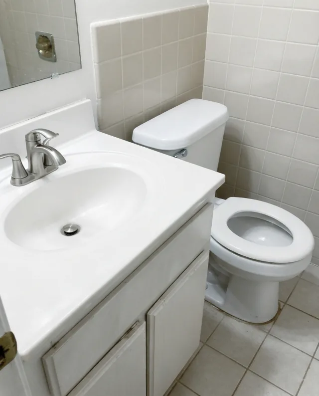 Bright bathroom with modern chrome fixtures — after upgrade
